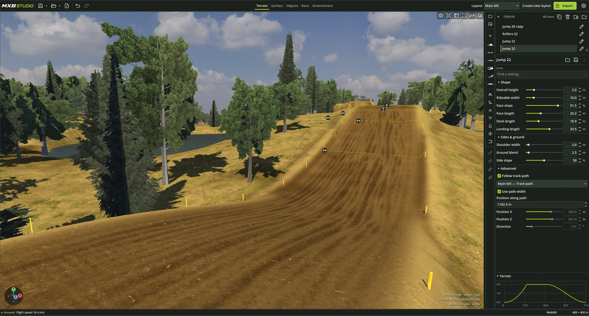 MXB Studio Terrain workspace showing a wooded motocross track, selected jump handles, and jump-shaping controls